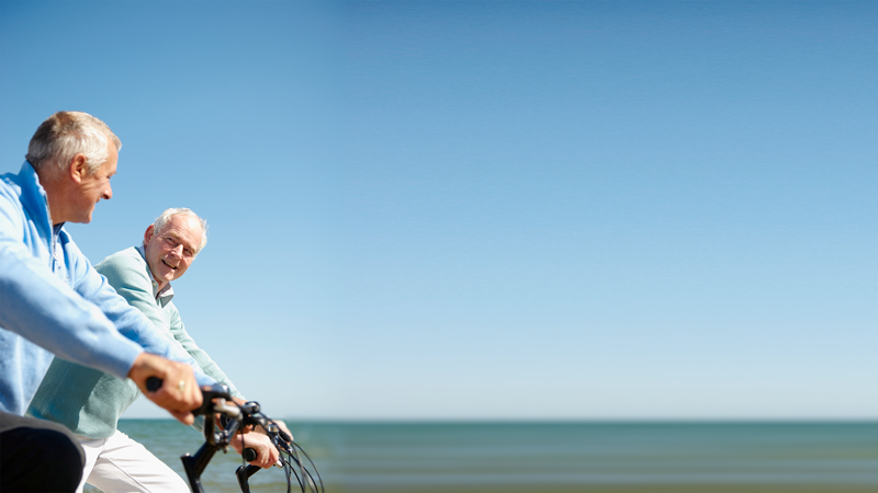 Image of two men biking - to be used with LoFric Origo / BPE campaign